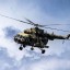 Над КПП «Гуково» и «Донецк» на небольшой высоте летают вертолеты Ми-8